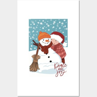 Cute wintery landscape with a Child making a snowman out in the snow Posters and Art